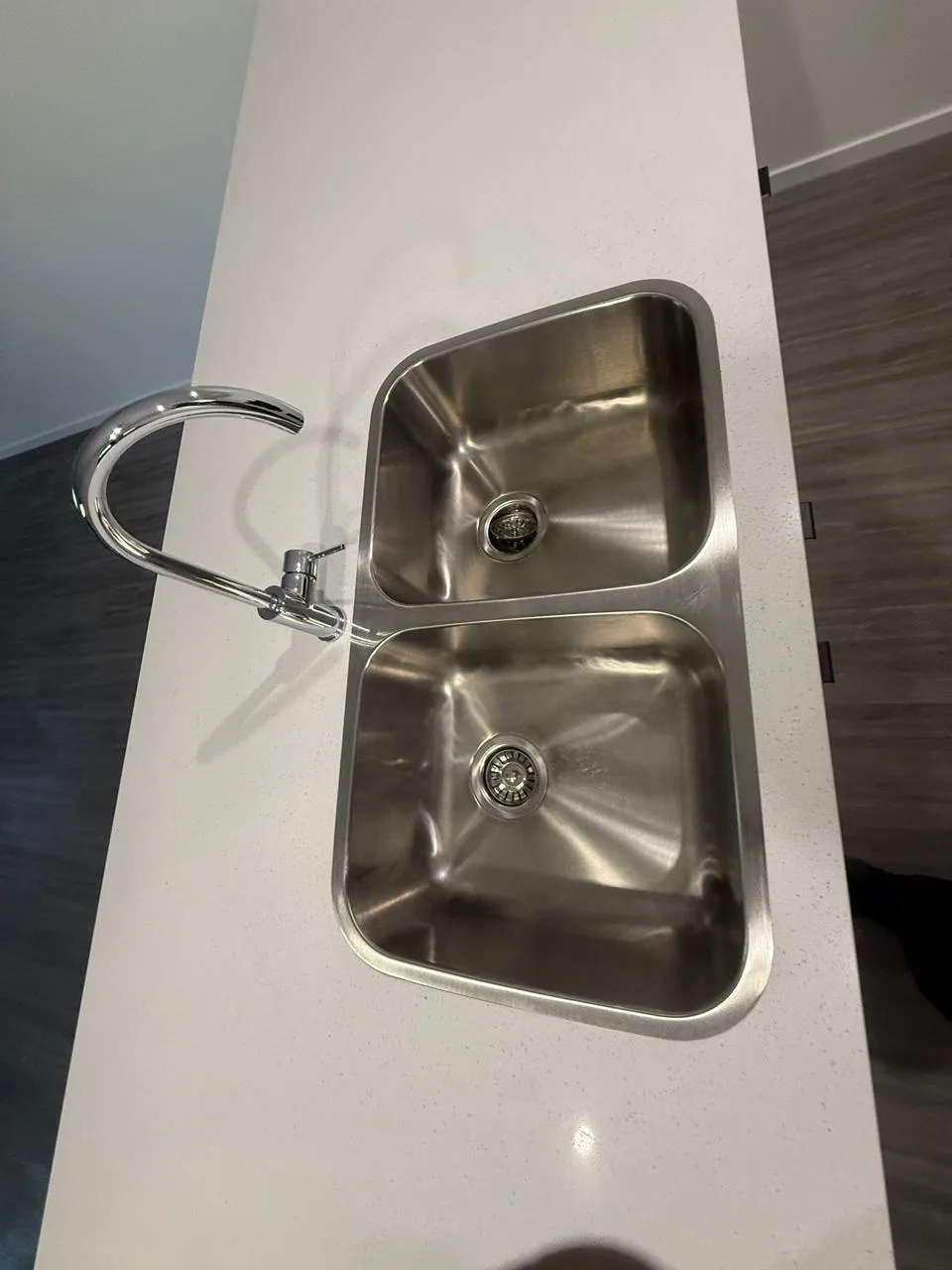 Sanitized bathroom vanity and streak-free mirror detail